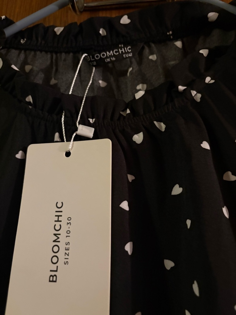 BloomChic Black Dress with White Heart Print